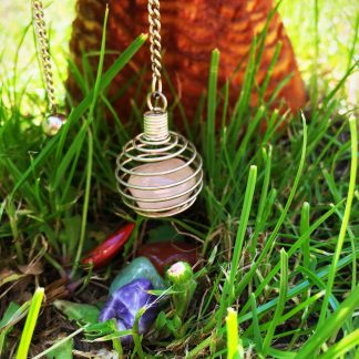 Cage with assorted crystals